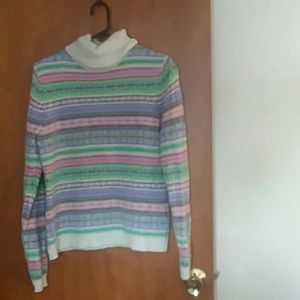 A turtleneck lambswool sweater.